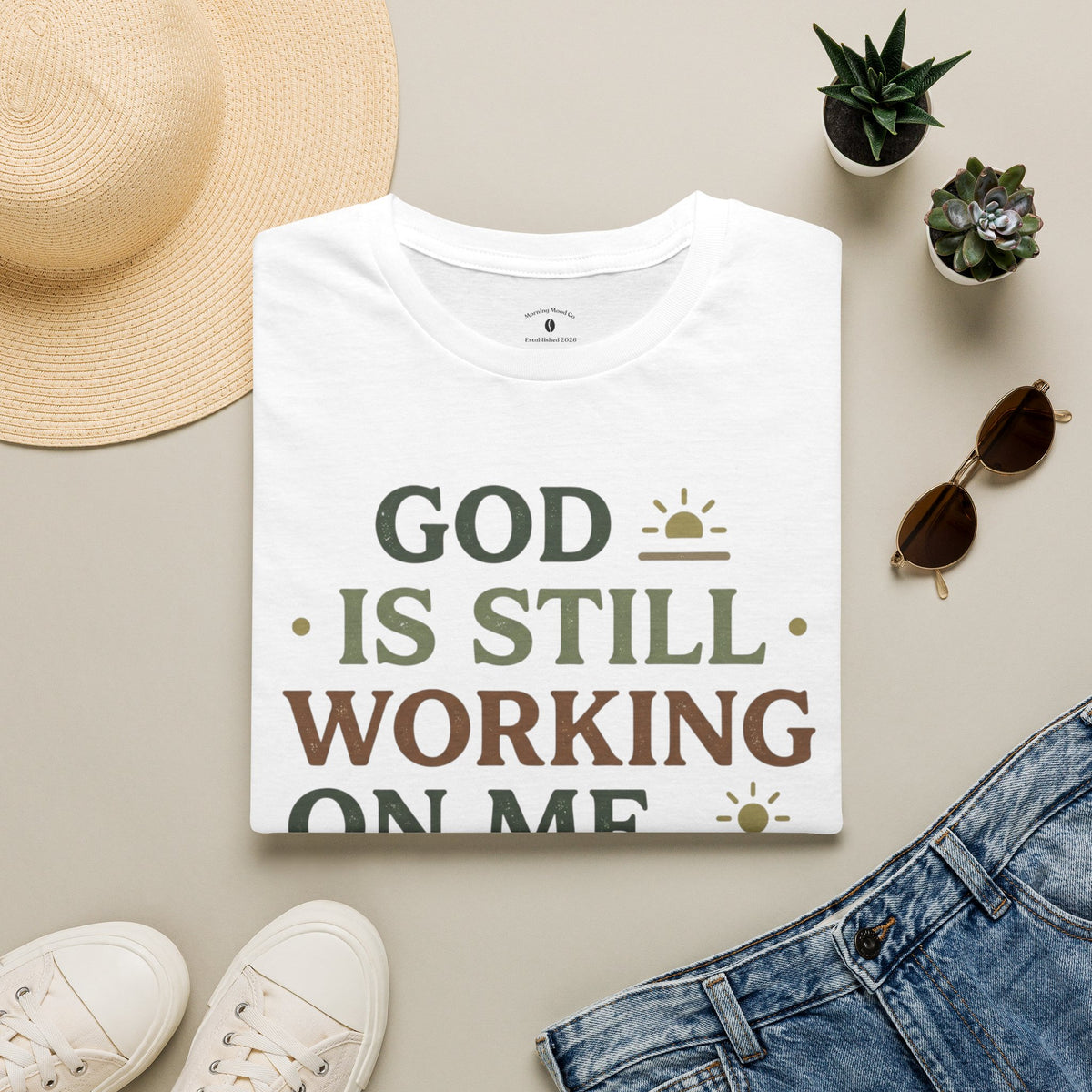 T-Shirt — "God Is Still Working On Me" Faith Graphic Tee