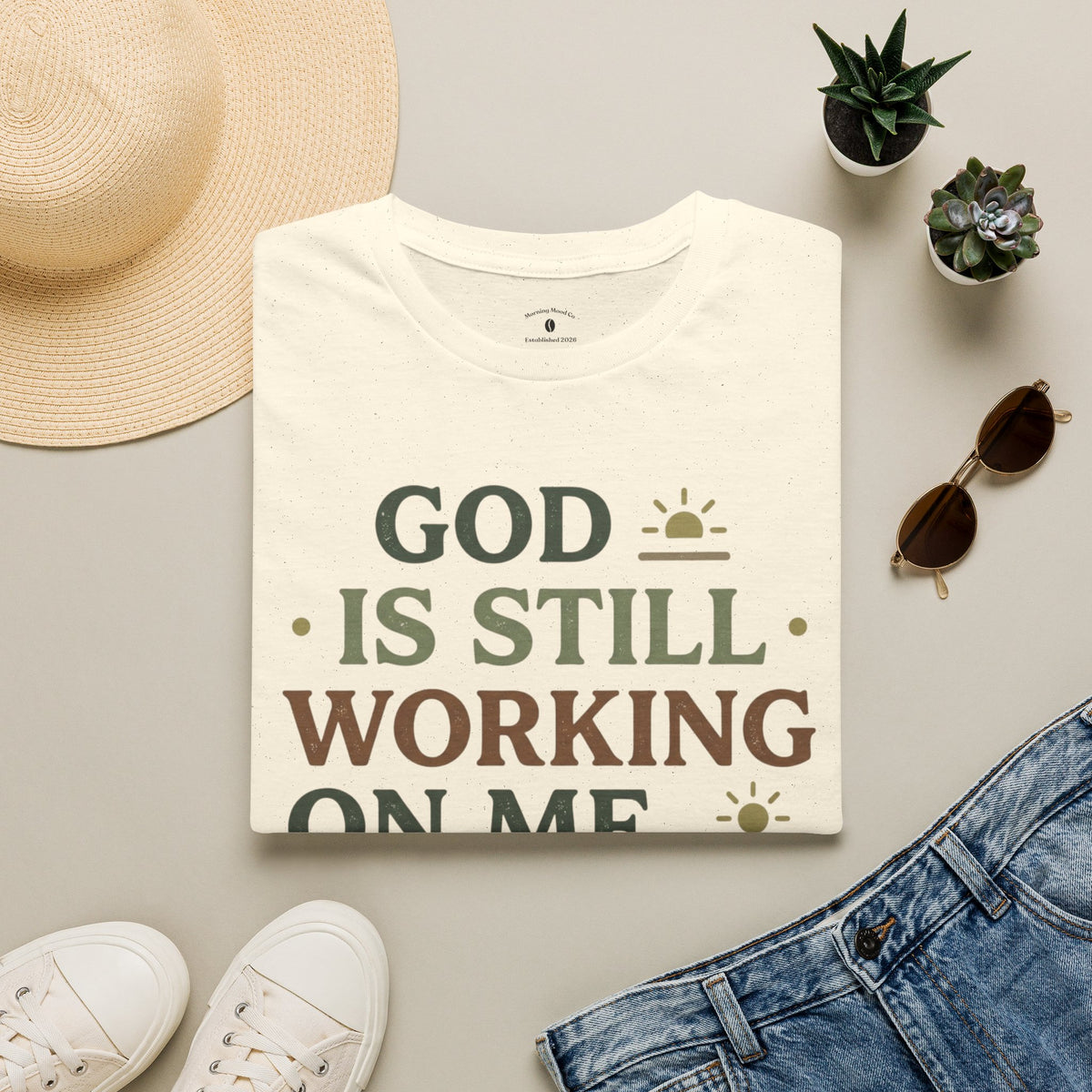 T-Shirt — "God Is Still Working On Me" Faith Graphic Tee